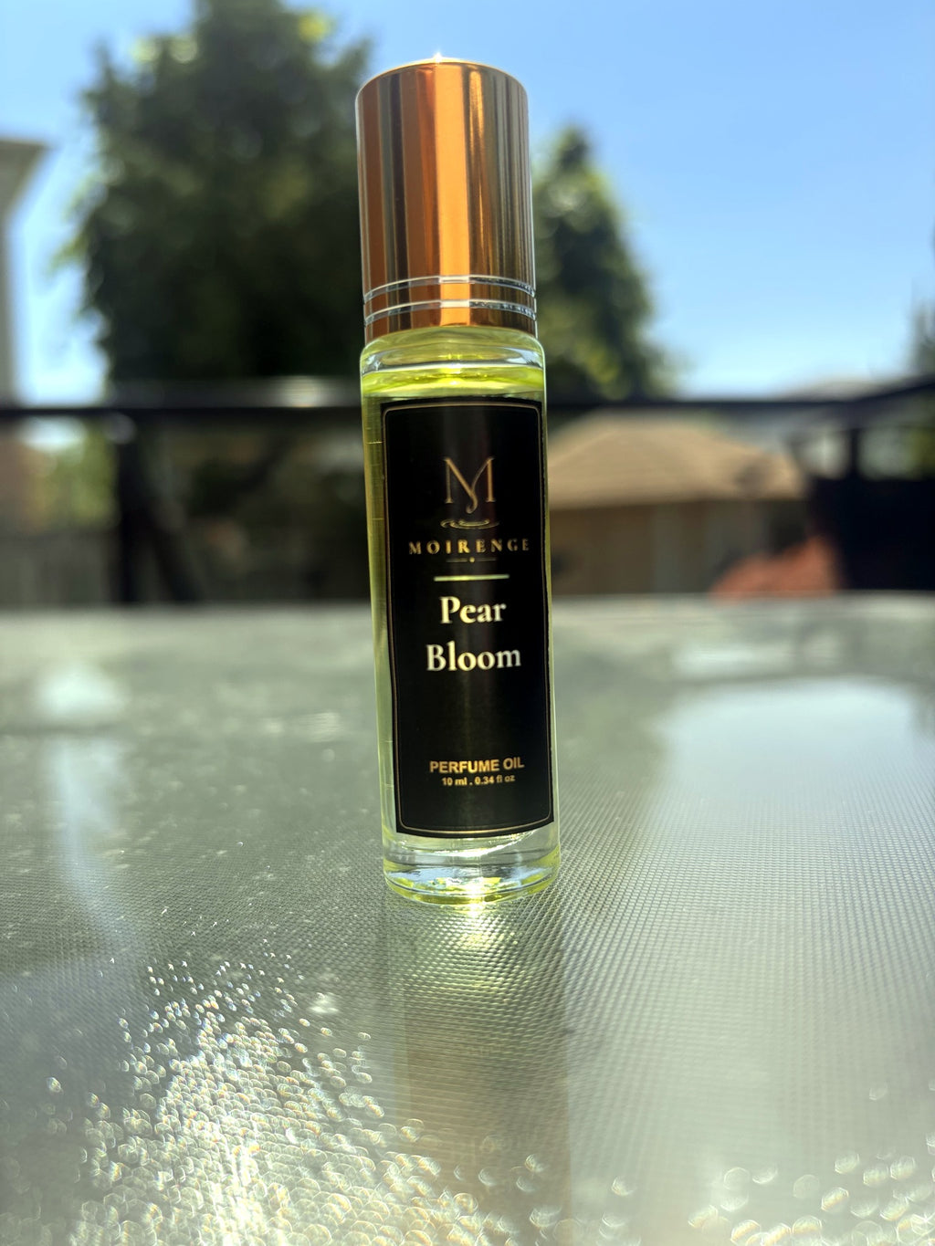 Pear Bloom alcohol-free perfume oil roll-on, hand-batched in Canada