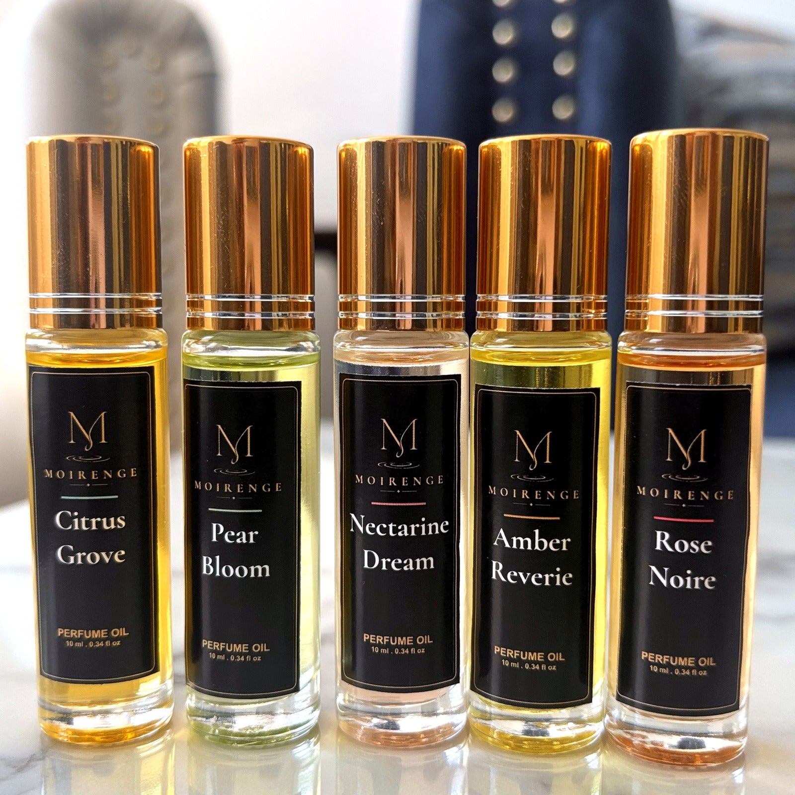 Pear Bloom alcohol-free perfume oil roll-on, hand-batched in Canada