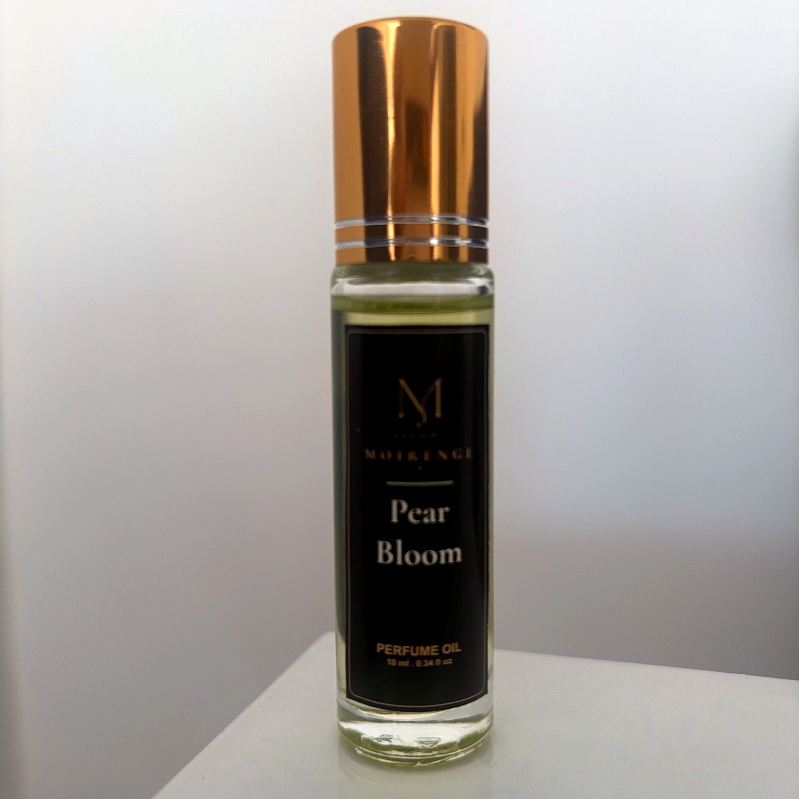 Pear Bloom alcohol-free perfume oil roll-on, hand-batched in Canada