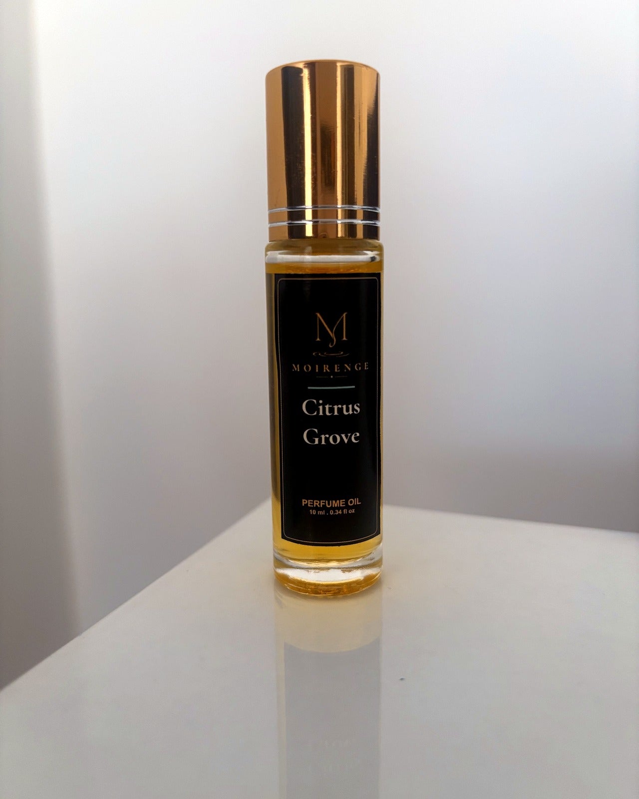 Citrus Grove alcohol-free perfume oil roll-on, hand-batched in Canada