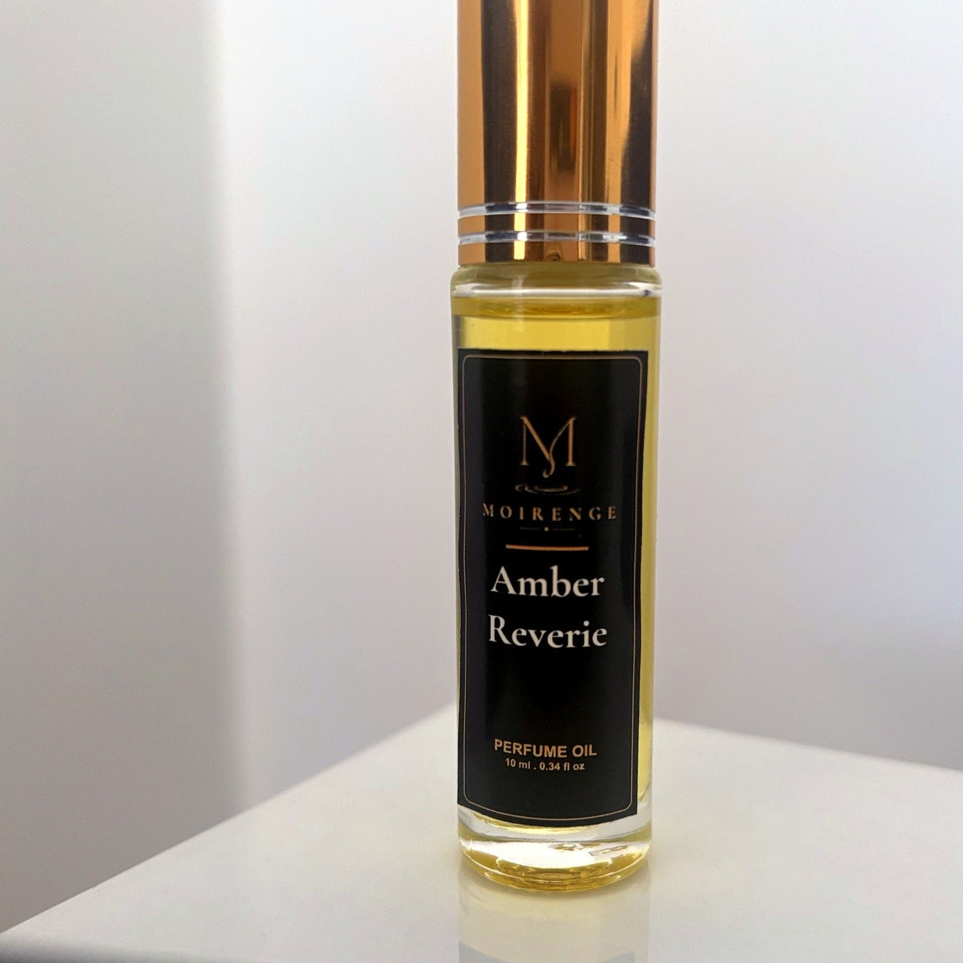 Amber Reverie alcohol-free perfume oil roll-on, hand-batched in Canada