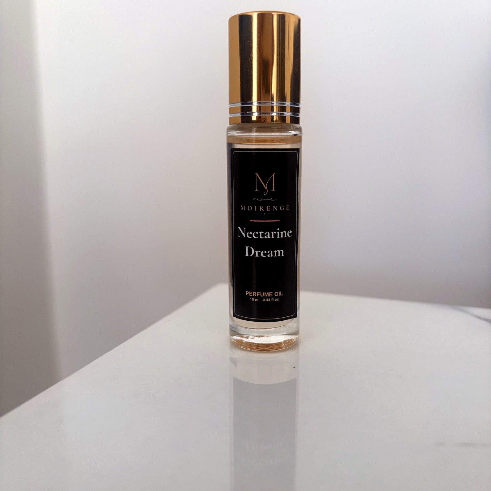 Nectarine Dream alcohol-free perfume oil roll-on, hand-batched in Canada