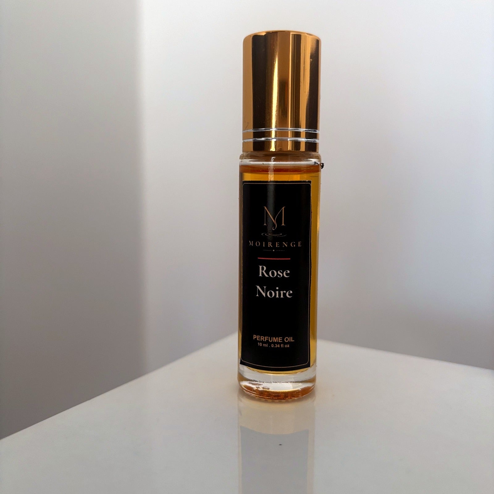 Rose Noire alcohol-free perfume oil roll-on, hand-batched in Canada